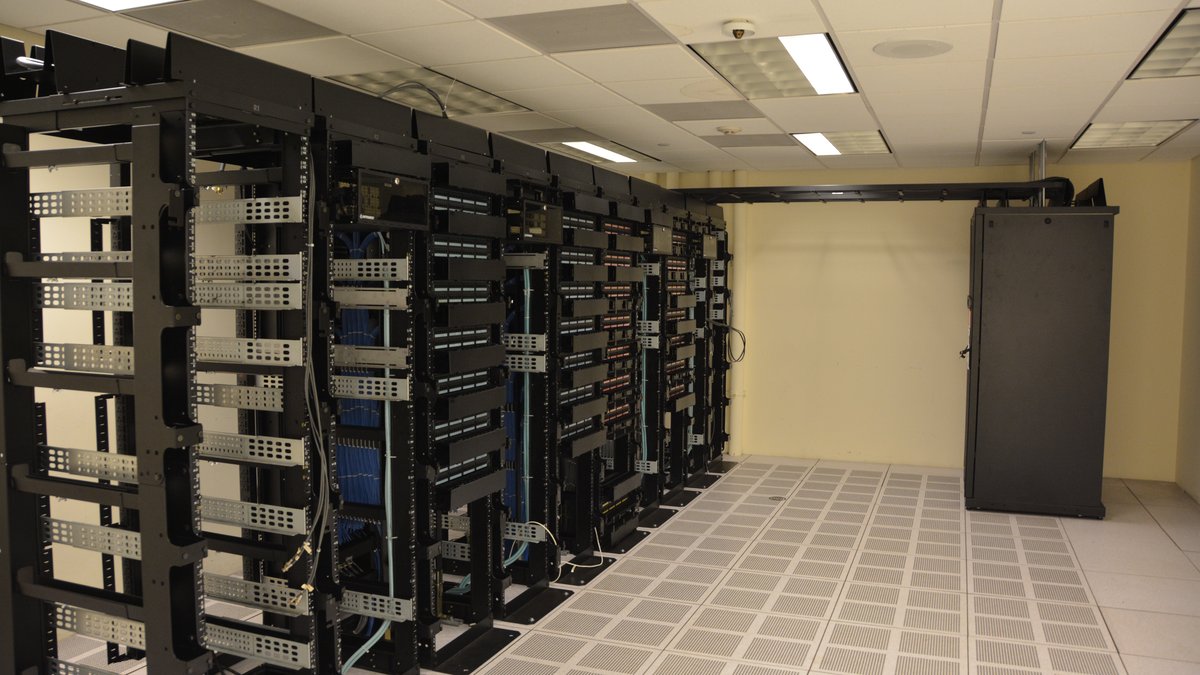 Generic photo of server racks in a data centre, used for illustration only; not a photo of any Tasmanian facility.