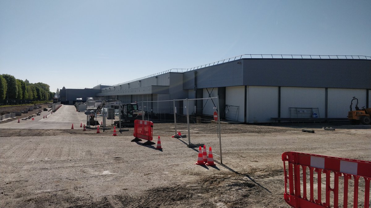 A data centre under construction, steel frame and cranes visible — illustrative image, not a Tasmanian or Australian facility.